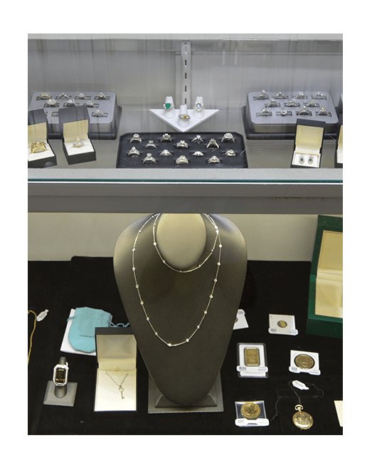 Necklace and rings with different stones at Howard's Pawn & Jewelry