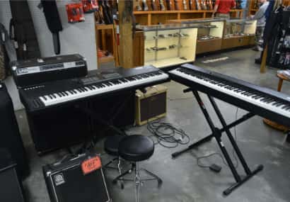 Keyboard musical instruments in a shop