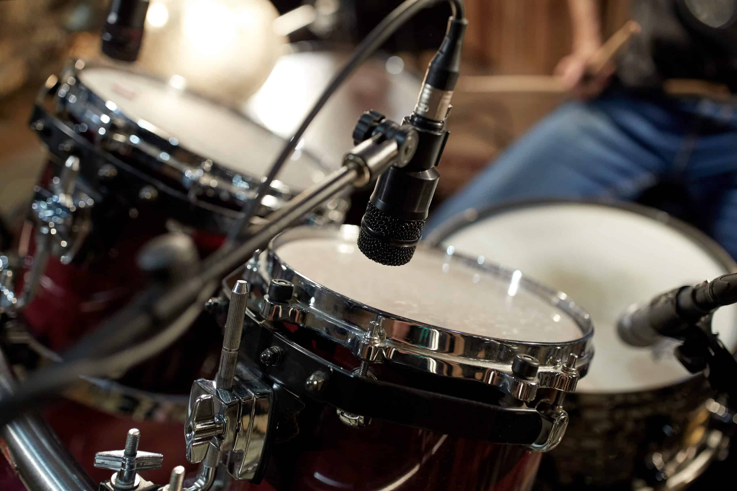 Drums and a microphone in a music studio